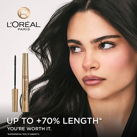 Image 1 - A woman with dark hair and defined eyelashes looks right, with two LOréal Telescopic mascara tubes beside her, and text that reads LORÉAL PARIS TELESCOPIC MASCARA UP TO +70% LENGTH* YOURE WORTH IT. *INSTRUMENTAL TEST, 27 SUBJECTS. Image 2 - Image shows a gold mascara tube next to a black stroke representing mascara and a gold ribbon, with text ELONGATES EACH LASH SMUDGE-RESISTANT FLAKE-RESISTANT UP TO 36H WEAR* DOESNT CLUMP LASHES TOGETHER LOREAL PARIS TELESCOPIC MASCARA *CONSUMER TEST, 108 SUBJECTS and a registered trademark symbol. Image 3 - A comparison grid shows three different pairs of eyes before and after treatment, demonstrating enhanced lash length, with text ENHANCED LENGTH FOR ALL LASH TYPES BEFORE AFTER and an R logo. Image 4 - A LOreal Telescopic mascara tube and wand are shown with a swatch of brown mascara product, alongside text that reads LOREAL PARIS TELESCOPIC MASCARA LASH SEPARATING COMB SEPARATES LASH BY LASH SMOOTH FORMULA COATS EVERY LASH and a registered trademark symbol. Image 5 - A gold tube of LOréal Paris Telescopic Mascara and a blue tube of LOréal Paris Waterproof Telescopic Mascara are displayed with their wands extended on a white surface, next to text reading YOUR ICONIC MASCARA ALSO IN WATERPROOF FORMAT LOREAL PARIS TELESCOPIC MASCARA LOREAL PARIS WATERPROOF TELESCOPIC MASCARA. Image 6 - Close-up of a woman applying mascara to her eye with the text TESTED UNDER OPHTHALMOLOGICAL CONTROL, OPHTHALMOLOGIST SUITABLE FOR SENSITIVE EYES TESTED, SUITABLE FOR SENSITIVE EYES, SUITABLE FOR CONTACT LENS WEARERS.