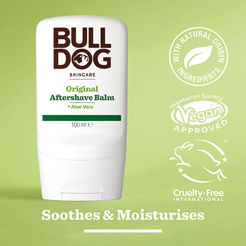 Image 2 - A white tube of Bulldog Skincare Original Aftershave Balm with Aloe Vera, set against a light green background, features the text BULL DOG SKINCARE Original Aftershave Balm + Aloe Vera 100 ml and the phrases Soothes & Moisturises, WITH NATURAL ORIGIN INGREDIENTS, Vegetarian Society Vegan APPROVED, and the Cruelty-Free International logo.
Image 3 - A close-up image of a green aloe vera leaf with a glossy surface, featuring text that reads 96% Natural Origin, Unlock the true potential of natural origin ingredients, Aloe Vera.
Image 4 - A white tube of Bulldog Skincare Original Aftershave Balm, labeled with Normal To Dry Skin and 100 ml, is placed on a light surface next to a green towel.
Image 5 - Image shows a tube of Bulldog Skincare Original Shave Gel and a container of Bulldog Skincare Original Aftershave Balm, both featuring a green background, with text reading Smooth & comfortable shave.