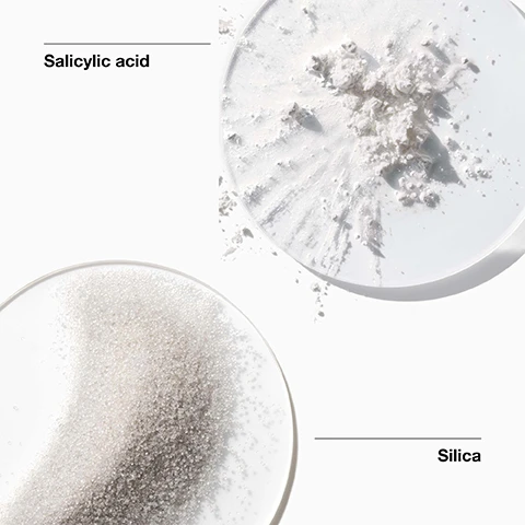 Image 1 - Image shows a close-up view of two petri dishes containing Salicylic acid, which appears as a white powdery substance on the top, and Silica, which consists of small, translucent granules at the bottom, with the labels Salicylic acid and Silica positioned beside each dish.
Image 2 - A green background lists various ingredients marked with a cross, indicating they are not included, such as fragrance, gluten, oil, drying alcohol, sodium lauryl sulfate, and sodium laureth sulfate.