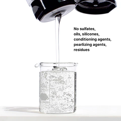 Image 1 - A black dispenser is pouring a clear liquid into a glass beaker filled with bubbles, accompanied by the text No sulfates, oils, silicones, conditioning agents, pearlizing agents, residues.
Image 2 - A travel-sized tube of Color Wow Color Security Shampoo with a silver metallic finish, featuring the text Color Security Shampoo The Ultimate Dream Clean and Sulfate-Free/Sans Sulfate, alongside the volume 75ml 2.5 FL OZ and the phrase TRAVEL SIZE at the bottom.
Image 3 - A large white bottle of Color Wow Color Security Shampoo with a black pump top, featuring the brand name in a bold font, and text that reads COLOR SECURITY SHAMPOO 100% clean, residue-free leaves no residues behind that dull color, weigh down hair or impede hair growth 946 ml 32 FL OZ SUPER SIZE.