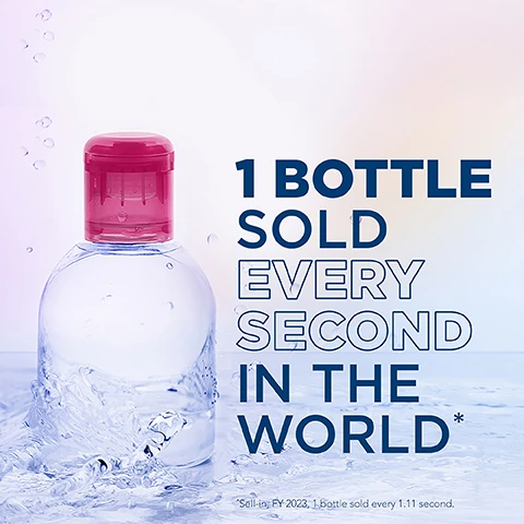 Image 1 - A transparent water bottle with a pink cap sits in water, accompanied by text stating 1 BOTTLE SOLD EVERY SECOND IN THE WORLD* and a footnote that reads Sell-by: FY 2023, 1 bottle sold every 1:11 second.
Image 2 - A transparent bottle of Bioderma Sensibio H2O micellar water is centered against a soft gradient background, with the text 30 YEARS repeated in large, white font behind it, and smaller text on the bottle stating Bioderma and The Original micellar water.
Image 3 - A close-up image of a model with a smooth complexion, showcasing her face and shoulder, accompanied by large text that reads -99% make-up, pollution, pollen*.
Image 4 - Close-up of a womans face with a natural makeup look, showcasing steps for using a skincare product, with visible text: 1 Soak a reusable cotton-pad and apply SENSIBIO H2O 2 Cleanse and remove make-up from face and eyes 3 No need to rinse-off for skincare benefits.
Image 5 - Close-up image of blue and gray micelles, which are small cleansing droplets, with text that reads MICELLAR TECHNOLOGY and a description about micelles capturing impurities while preserving the skins natural protective film.