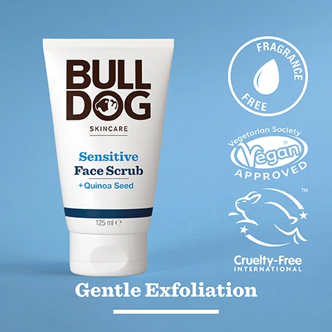 Image 2 - A white tube labeled Bulldog Skincare, featuring the text Sensitive Face Scrub + Quinoa Seed, 125 ml, and logos indicating it is fragrance free, vegan approved, and cruelty-free, with the phrase Gentle Exfoliation displayed below.
Image 3 - An overhead view of scattered quinoa seeds on a light background with the text 98% Natural Origin, Unlock the true potential of natural origin ingredients, and Quinoa Seeds.
Image 4 - A person holds a tube of Bulldog Skincare Sensitive Face Scrub, which features the text Sensitive Face Scrub + Quinoa Seed Gentle Exfoliation and 125 ml along with the phrase Sensitive Skin at the bottom.
Image 5 - A tube of Bulldog Skincare Sensitive Face Scrub, featuring a white and blue design, sits on a stone surface, with text indicating it contains quinoa seed for gentle exfoliation and noting its recycled tube composition.
Image 6 - Three Bulldog skincare tubes are displayed on a countertop, featuring Sensitive Face Scrub, Sensitive Moisturiser, and Sensitive Face Wash with visible text stating Gently Cleanses & Hydrates.