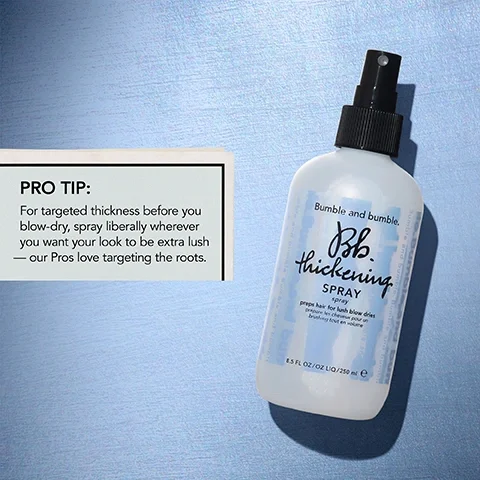 Image 1 - A spray bottle labeled Bumble and bumble Bb. thickening spray is shown on a textured blue background, with visible text that reads: PRO TIP: For targeted thickness before you blow-dry, spray liberally wherever you want your look to be extra lush — our Pros love targeting the roots. The product is 8.5 fl oz.