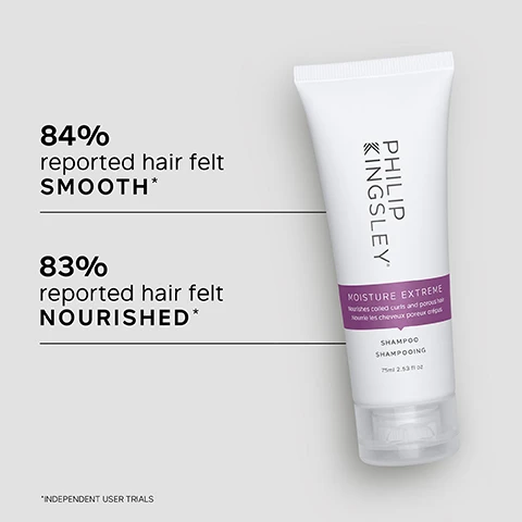 Image 1 - A tube of Philip Kingsley Moisture Extreme shampoo is displayed, with the visible text stating that 84% reported hair felt smooth and 83% reported hair felt nourished, along with asterisks denoting independent user trials.
Image 2 - Image shows a light gray background with soap bubbles and a list of key benefits that includes rich hydrating formula, cleanses conditions and detangles, suitable for natural relaxed or synthetic hair, and tames even the toughest frizz.
Image 3 - A woman with curly hair smiles while displaying a customer review that reads: The only shampoo my porous dry hair likes. GREAT SLIP… Doesn’t dry out your hair and left my crunchy ends HYDRATED! CUSTOMER REVIEW.
Image 4 - A round white dish with three bullet points next to it listing the key ingredients: Sugarcane-derived Quat, Guar, and Sodium C, with descriptions of their benefits.
Image 5 - Image showing two side-by-side views of curly hair: the left labeled Before displays frizzy, unkempt curls, while the right labeled After shows the same hair styled neatly with defined curls.
Image 6 - A person with long, dark, curly hair is washing their hair with hands covered in shampoo, and the image includes the text that reads Trichologist Tip: Wet hair and lather well with a gentle kneading of the scalp for 60 seconds. Rinse well.