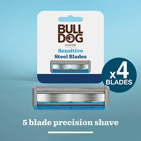 Image 2 - A package of Bulldog Skincare Sensitive Steel Blades is displayed against a light blue background, showing the product name and indicating four blades are included, with text stating 5 blade precision shave.
Image 3 - A close-up image of a persons neck being shaved with a razor featuring a bamboo handle, with visible lather on the skin and the text Responsibly sourced bamboo handle below.
Image 4 - A close-up of a silver razor with a blue blade and a wooden handle, featuring the text designed to prevent against skin irritation.
Image 5 - A packaging for Bulldog Skincare Sensitive Steel Blades is displayed, featuring the product name and description, with text stating Recycled & Recyclable displayed in the background.
Image 6 - Image shows two grooming products from Bulldog Skincare against a light blue background: a packaging for sensitive steel blades with the text Sensitive Steel Blades Designed to prevent against skin irritation and a sensitive bamboo razor with the text Sensitive Bamboo Razor Designed to prevent against skin irritation, along with the tagline A quality shave responsibly crafted.