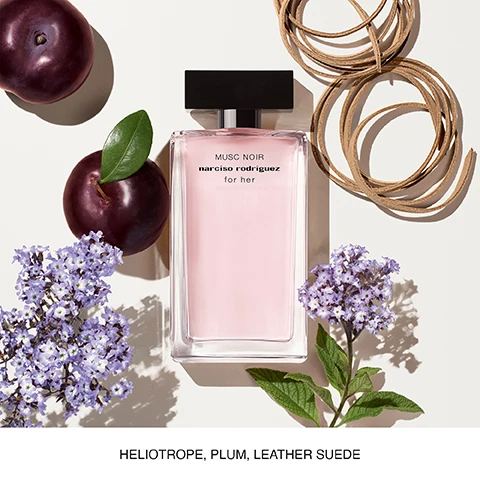 Image 1 - A clear glass perfume bottle labeled MUSC NOIR narciso rodriguez for her is surrounded by purple plums, lavender flowers, and leather suede strips on a light background, with text reading HELIOTROPE, PLUM, LEATHER SUEDE.
Image 2 - Five perfume bottles arranged on a light background, labeled from left to right as Eau de Toilette, Eau de Parfum, Pure Musc, Musc Noir, Musc Noir Rose, and Musc Nude, with descriptions of their characteristics and fragrance notes listed below each bottle.