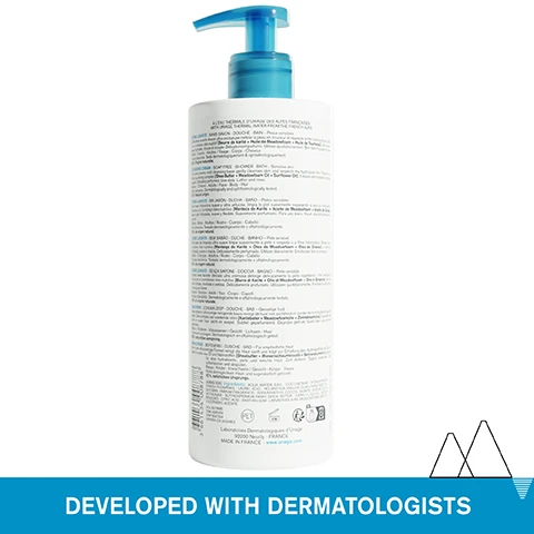 Image 1 - A white bottle with a blue pump dispenser is shown with text on the label including À LEAU THERMALE DURIAGE DES ALPES FRANÇAISES and CLEANSING CREAM, with DEVELOPED WITH DERMATOLOGISTS text in a blue bar below. Image 2 - A close-up image shows skin with white cream and overlaid text reading Mild foaming nourishing cream, Face Body & Hair, and ALL SKIN TYPES - EVEN SENSITIVE. Image 3 - A person in a bathtub blows bubbles from their hands, with text that reads 94%* immediate hydration Fresh & cocooning perfume For the whole family *Use test on sensitive skin - 21 days - 17 subjects - % of satisfaction. Image 4 - A scenic mountain landscape with a lake reflecting the peaks, overlaid with icons and text labels: Dermatologically tested, Soap-free, Physiological pH (5,5), 92% ingredients of natural origin. Image 5 - Image shows graphic about ingredients featuring a nut icon, the Uriage logo LEAU THERMALE DES ALPES URIAGE FRENCH ALPS THERMAL WATER, text Shea Butter + Meadowfoam Oil + Sunflower Oil Deeple nourishes, leaves the skin supple and soft, URIAGE THERMAL WATER 100% pure & natural, softens and soothes all skin types, and ADVANCED DERMATOLOGICAL FORMULA. Image 6 - White bottle of Uriage Eau Thermale Cleansing Cream with a blue pump dispenser, featuring a circular logo Developed by Dermatologists, montagne illustration, and text NOUVELLE FORMULE NEW FORMULA CRÈME LAVANTE Nettoie, Nourrit, Protège CLEANSING CREAM Cleanses, Nourishes, Protects 92% ORIGINE NATURELLE PEAUX SENSIBLES/ SENSITIVE SKIN VISAGE - CORPS - CHEVEUX FACE - BODY - HAIR TESTÉ SOUS CONTRÔLE DERMATOLOGIQUE URIAGE, LEAU THERMALE DES ALPES 500 ml e 17 fl.oz. 15141070 next to a swirl of white cream.