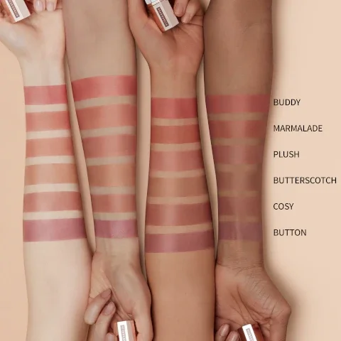 Swatches of the product on four different skin tones