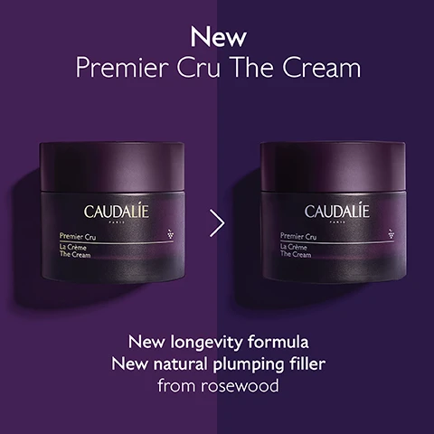 Image 1 - Image shows two jars of Caudalie Premier Cru The Cream on a gradient background; visible text reads New Premier Cru The Cream, New longevity formula, and New natural plumping filler from rosewood.
Image 2 - Before and after image comparing forehead wrinkles, showing significant reduction on the right side, with visible text stating Forehead wrinkles reduced by 93% and Unretouched results after using Premier Cru The Cream 2X a day for 2 months.
Image 3 - Image shows four different skincare cream textures on a purple background, labeled from top to bottom as The Serum, The Cream, The Rich Cream, and The Eye Cream.
Image 4 - A dark purple background features a jar of Caudalie Premier Cru cream surrounded by black grapes and a dollop of cream; visible text includes Natural plumping filler Improves skin volume Longevity patent Stimulates youth proteins Viniferine Corrects and prevents dark spots.
Image 5 - A person holds a dark purple jar of Caudalie Premier Cru La Crème in front of green grape leaves with text that reads Longevity patent 2x more volume after 1 jar* and *Skin looks more plump. In vitro test on Premier Cru The Cream after 17 applications during 58 days.
Image 6 - Image shows two jars of CAUDALIE skincare products side by side, labeled The Cream on the left and The Rich Cream on the right, with a textured background; visible text lists benefits for each: Wrinkles, dark spots, volume, All skin types, Cream texture for The Cream and Dry skin, Rich texture for The Rich Cream.
Image 7 - A woman with long brown hair holds a bunch of dark grapes near her face, smiling and promoting a skincare product with visible text that reads Targets all signs of ageing, followed by checkmarks for Wrinkles, Dark spots, and Volume.
Image 8 - A person holds a small purple jar of cream with a silver lid, showcasing the text Refillable format -89% less packaging* and CAUDALIE Premier Cru La Crème The Cream.
Image 9 - Image shows a hand holding a jar of Caudalie Premier Cru The Cream with instructions on how to recycle it, text includes How to recycle Premier Cru The Cream 1 Keep the glass jar and the lid 2 Recycle the empty refill in the recycling bin 3 Insert a new refill into your jar.