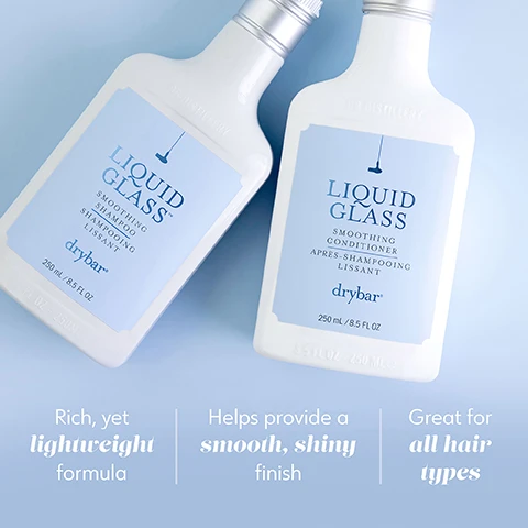 Image 1 - Two white bottles of Drybar Liquid Glass Shampoo and Conditioner, with light blue labels that read Liquid Glass, Smoothing Shampoo, Smoothing Conditioner, and drybar, along with descriptions of a rich yet lightweight formula, smooth shiny finish, and suitability for all hair types.
Image 2 - Image shows a light background with three labeled sections outlining benefits of ingredients: Vegan Keratin which helps seal, reinforce and smooth the hair cuticle, Neroli Oil which smooths and helps prevent frizz for a glossy finish, and Murumuru Butter which helps soften and improve hair manageability.
Image 3 - Two bottles of Liquid Glass smoothing shampoo and conditioner are displayed against a light blue background, with text stating made without: gluten, honey, keratin, protein, nut oils, plus its vegan & cruelty free.