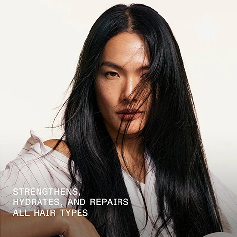 Image 1 - A woman with long, dark hair partially obscures her face, wearing a light-colored off-the-shoulder top, with text that reads STRENGTHENS, HYDRATES, AND REPAIRS ALL HAIR TYPES.
Image 2 - A bottle of Olaplex No. 4 Bond Maintenance Shampoo with bubbles surrounding it, displaying the text 90% SMOOTHER, BETTER DETANGLING, MORE CONDITIONED*, and additional product details including REPAIRS, STRENGTHENS, & NOURISHES ALL HAIR TYPES, 250 ml/Net 8.5 fl oz, and a footnote regarding use with other products.
Image 3 - A side-by-side comparison of hair before and after treatment, with noticeable differences in smoothness and shine, labeled BEFORE on the left and AFTER on the right, and additional text below stating UNRETOUCHED IMAGES and details about the hair care products used.
Image 4 - A side-by-side comparison of hair showing a frizzy texture on the left labeled BEFORE and smooth, sleek hair on the right labeled AFTER, with additional text at the bottom stating UNRETOUCHED IMAGES* *Results may vary. Results achieved by cleansing with N°4 Bond Maintenance® Shampoo, conditioning with N°5 Bond Maintenance® Conditioner, then styling.
Image 5 - Image shows two close-up sections of curly hair: the left side labeled BEFORE with frizzy texture and the right side labeled AFTER displaying defined and smooth curls, with additional text below stating UNTOUCHED IMAGES* *Results may vary. Results achieved by cleansing with Nº4 Bond Maintenance® Shampoo, conditioning with Nº5 Bond Maintenance® Conditioner, and applying Nº9 Bond Protector Nourishing Hair Serum to damp hair before styling.
Image 6 - Image depicts two OLAPLEX hair care products: the No. 4 Bond Maintenance Shampoo and the No. 5 Bond Maintenance Conditioner, along with the text Pair Up for a Bestselling Routine, Strengthen + Nourish, and Moisturize + Smooth.