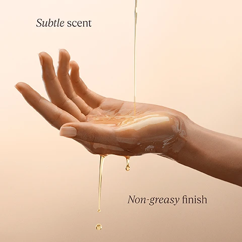 Image 1 - A close-up of a hand with a light sheen of oil in the palm, with droplets falling, accompanied by the text Subtle scent above and Non-greasy finish below.
Image 2 - A transparent bottle is being filled with a golden shower oil, and text above reads Refills your bottle once finished.
Image 3 - Two smooth, tanned legs are shown against a light background, with text stating 92% said their skin felt supple and hydrated* and a note about a consumer test on 39 volunteers for one month.