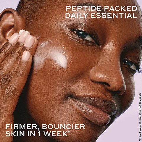 Image 2 - A person with dark skin applies white cream to their cheek, with text reading Peptide Packed Daily Essential, Firmer, Bouncier Skin in 1 Week*, and *In an 8-week clinical study of 38 people. Image 3 - An open purple and pink jar of OLEHENRIKSEN Strength Trainer Peptide Boost Moisturizer revealing light pink cream inside, with visible text reading OLEHENRIKSEN STRENGTH TRAINER Peptide Boost Moisturizer Vegan Peptides & Ceramides Peptides et céramides végan, FIRMER, BOUNCIER SKIN*, VISIBLY IMPROVES fine lines + wrinkles*, ALL-DAY skin barrier strengthening**, and the disclaimer text *In an 8-week clinical study of 38 people, after 1 week **In an 8-week clinical study. Image 4 - Thick white cream swatches on a light purple background with the text CUSHIONY + CLOUD-SOFT balm-to-gel hydration. Image 6 - A split image shows the right side of a womans face, before and after 1 week of using a product, revealing visibly smoother, more hydrated, and radiant skin in the after photo, with visible text reading BEFORE, AFTER 1 WEEK, STRENGTH TRAINER PEPTIDE BOOST MOISTURIZER, and ALL DAY SKIN BARRIER STRENGTHENING*. Image 7 - A white cream swatch on a lavender background is surrounded by four circular insets displaying ingredients and their benefits, with the main title reading PEPTIDE-POWERED + CERAMIDE FORTIFIED, featuring 8 PEPTIDES Strengthen + condition skin, 3 CERAMIDES Moisture barrier lipids bind moisture + fortify the barrier, HYALURONIC ACID Moisture-binding humectant plumps skin with instant + lasting hydration, and NIACINAMIDE, VITAMIN E, B12 + PANTHENOL Work together to nourish + support clear, healthy-looking skin. Image 8 - A comparison chart titled WHICH MOISTURIZER IS RIGHT FOR YOU? features two Ole Henriksen products: on the left, a purple jar of STRENGTH PEPTIDE BOOST MOISTURIZER, with text OLEHENRIKSEN STRENGTH Strength Trainer Peptide Boost Moisturizer Vegan peptides & ceramides Peptides et ceramides vegan, and listed benefits are FIRMS, SMOOTH FINE LINES, and STRENGTHEN SKIN BARRIER; on the right, an orange-yellow jar of BANANA BRIGHT+ INSTANT GLOW MOISTURIZER, with text OLEHENRIKSEN TRUTH Banana Bright+ Instant Glow Moisturizer Gold-complexed vitamin C & niacinamide Vitamine C gold et niacinamide, and listed benefits are BRIGHTENS, EVEN SKIN TONE, and REDUCE DARK SPOTS. Image 9 - A lavender background features three Ole Henriksen skincare products: a light purple tube of Apres Skin Multi-Use Rich Rescue Creme 75ML/2.5FL.OZ. with ceramides and vitamin complex visible on the label and pink cream squeezed from the top, a brown bottle of STRENGTH HydraBarrier Nourishing Face Oil containing Cloudberry oil, vegan peptides & vitamin E, and a purple jar of STRENGTH Strength Trainer Peptide Boost Moisturizer, with accompanying text DRY SKIN RESCUE + BARRIER REPAIR, PEPTIDE BOOST MOISTURIZER Daily moisturizer for plumping hydration + firmer, bouncier skin, HYDRABARRIER OIL Locks in hydration to maximize results, and RICH RESCUE CRÈME Overnight moisturizer + leave-on mask for intense repair + hydration. Image 10 - An image displays three OLEHENRIKSEN skincare products stacked diagonally on a light peach background: a pink tube of OLEHENRIKSEN Pout Preserve Peptide Lip Treatment with a pink drop oozing out, an orange jar of OLEHENRIKSEN TRUTH Banana Bright+ Eye Crème, and a white and purple jar of OLEHENRIKSEN STRENGTH Strength Trainer Peptide Boost Moisturizer; visible text on the left highlights these products as BEST OF OLE, describing PLUMP POUT as an Ultra-nourishing lip treatment to plump with hydration + get clinically fuller-looking lips in 1 week*, BRIGHT EYES as an Illuminating eye crème to visibly improve dark circles + crow’s feet**, and BOUNCY SKIN as a Daily moisturizer for firmer, bouncier skin in 1 week***; the image also contains the disclaimer *In an 8-week clinical study of 38 people, **35 people, ***39 people.