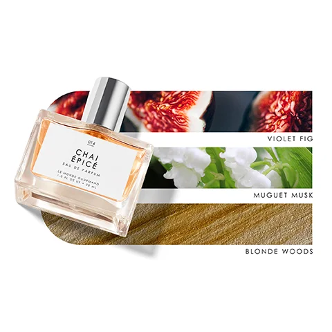 Image 1 - A bottle of perfume labeled CHAI EPICE EAU DE PARFUM with notes of violet fig, muguet musk, and blonde woods displayed behind it.