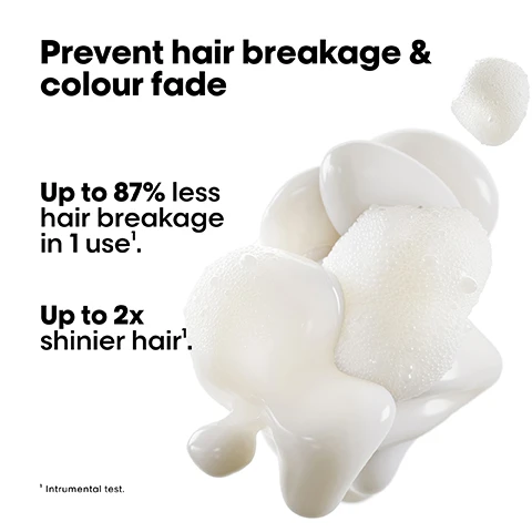 Image 1 - A white, foamy substance appears in a dynamic shape, accompanied by bold text that reads Prevent hair breakage & colour fade, Up to 87% less hair breakage in 1 use, Up to 2x shinier hair, followed by a footnote stating Instrumental test.
Image 2 - A bottle of LOréal Professionnel Paris hair product with a pouring spout, accompanied by text stating High pro performance, Up to 73% less plastic, and Save up to 15%/ml.
Image 3 - Image shows four hair transformations in a split image format, with two models on the top row labeled Before and After, and two models on the bottom row also labeled Before and After, along with a collection of hair care products displayed at the bottom, with the text stating The full Metal Detox routine for breakage and colour fade protection and Not retouched.
Image 4 - Image of three hair care products from LOréal Professionnel, featuring a shampoo bottle labeled 01 Cleanse, a treatment jar labeled 02 Treat, and a styling serum labeled 03 Style, with a background of a creamy product texture and the text The anti-breakage professional routine.
Image 5 - Image showing a step-by-step guide on how to refill shampoo, with numbered instructions: 01 Take your empty shampoo bottle. Do not rinse it. Unscrew the bottle & refill caps. 02 Take the refill pouch and pour it up slowly inside the bottle. 03 Screw the cap and use your shampoo as usual. Refill the bottle maximum 3 times.
Image 6 - A graphic featuring flowing strands of hair with metallic particles, accompanied by the text: Did you know that wash after wash, metal penetrates inside your hair? LOREAL PROFESSIONAL PARIS #MetalDetox
Image 7 - A close-up image of a glossy, translucent spherical object with metallic and crumpled elements inside, alongside the text: THE TECH Glicoamine Traps and neutralises metal inside the fibre.
Image 8 - Image shows a step-by-step guide for using LOréal Metal Detox products, including a small bottle, a large pouch, and instructions indicating the process of opening, pouring, and sealing the bottle. Visible text includes LORÉAL and Metal Detox.