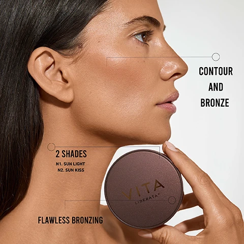 Image 1 - A close-up profile of a woman with a smooth complexion holding a round bronzing product labeled VITA LIBERATA, with text indicating 2 SHADES, N1 SUN LIGHT, N2 SUN KISS, CONTOUR AND BRONZE, and FLAWLESS BRONZING.
Image 2 - A woman with long blonde hair is applying makeup using a brush to her cheek, while instructions for use are displayed beside her, including three steps: Step 1 - Swirl brush and tap on the edge of the jar; Step 2 - Apply to the face, neck and décolleté in sweeping movement; Step 3 - Add extra to cheekbones for a contouring effect.
Image 3 - An image of loose mineral powder makeup called Trystal, featuring a makeup brush, scattered powder, and a clear container, with visible text reading Trystal, ultra fine loose mineral, powder formula, superb for contouring & adding definition, natural bronze effect, 2 shades, N1. Sun Light, N2. Sun Kiss.