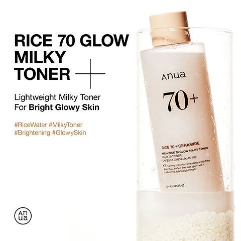 Image 1 - A bottle of Anua Rice 70 Glow Milky Toner is partially submerged in water with rice grains, and the text includes RICE 70 GLOW MILKY TONER, Lightweight Milky Toner For Bright Glowy Skin, and hashtags #RiceWater #MilkyToner #Brightening #GlowySkin.
Image 2 - Image of a bottle of Anua Rice 70 Glow Milky Toner with liquid spilling over the top, accompanied by text detailing its benefits: Hydrates & Brightens Skin To Achieve Glass Skin, Brightens Uneven Skin Tone, Balances Excess Sebum Production, Helps Protect the Skin Barrier.
Image 3 - Image shows a close-up of a clear, watery substance with bubbles, and text describing skin care ingredients: Gentle Yet Effective Ingredients: Rice Water, Niacinamide & Ceramides. 70% ANUA RICE WATER+TM Helps brighten the skin for even complexion. NIACINAMIDE Helps balance sebum production and oil production. CERAMIDES Helps to form stronger skin barrier.
Image 4 - A close-up of a persons face highlighting smooth skin; visible text includes statistics: 100% experienced immediate moisturization after only 1 use*, 100% noticed reduction in excess oil and sebum**, and 95% saw an improvement in brighter and clearer skin complexion**.
Image 5 - Image shows a before-and-after comparison of skin, highlighting decreased sebum production after four weeks of use, with visible text stating Sebum Production Significantly Decreased & Controlled After 4 Weeks Of Use! Sebum Production Improved by 12.9% Before Use After 4 Weeks of Use along with a footnote about a clinical trial.
Image 6 - Image shows a hand holding a bottle of liquid skincare product while another hand is positioned with the palm facing up, alongside text that reads When To Apply, Apply with a cotton pad or pat with the palm of your hands all over face, Can be used every day, AM & PM.