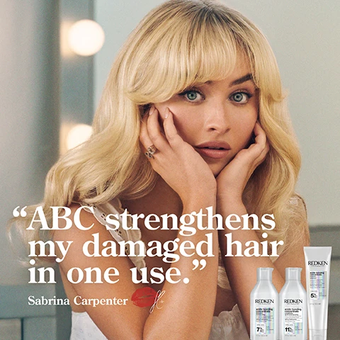Image 1 - A woman with blonde hair and blue eyes is resting her face on her hands, looking thoughtfully at the camera, with three hair care products displayed beside her and text that reads ABC strengthens my damaged hair in one use Sabrina Carpenter.
Image 2 - A bottle of Redken Acidic Bonding Concentrate Shampoo is shown with bubbles and a gray background, featuring text that reads 56% LESS BREAKAGE*, SILKY FINISH & GLOSSY SHINE, and 11X SMOOTHER**.
Image 3 - Close-up of a shampoo bottle with its cap open showing a dollop of cream inside, featuring text that reads 56% LESS BREAKAGE*, 90% MORE CONDITIONED*, and 11X SMOOTHER**, along with a footnote about brushing tests with acidic bonding concentrate products.
Image 4 - A person holds a tube of Redkens acidic bonding concentrate with product being dispensed onto their palm, showcasing claims of combating visible damage, reducing split ends, and providing heat protection up to 230°C.
Image 5 - An abstract image featuring thick, creamy hair care products in white tones, with visible text stating CITRIC ACID + BONDING CARE COMPLEX HELPS REPAIR BONDS + PREVENT FUTURE DAMAGE.
Image 6 - Image showing a side-by-side comparison of a womans hair before and after using a hair treatment, with the left side labeled BEFORE showing frizzy hair and the right side labeled AFTER ONE USE* showing smooth, glossy hair; visible text at the bottom reads SYSTEM OF ACIDIC BONDING CONCENTRATE SHAMPOO, CONDITIONER & LEAVE-IN.
Image 7 - Image shows a side-by-side comparison of hair before and after using a treatment; the left side depicts dry, frizzy hair labeled BEFORE, while the right side features smooth, sleek hair labeled AFTER ONE USE* with additional text stating *SYSTEM OF ACIDIC BONDING CONCENTRATE INTENSIVE TREATMENT; SHAMPOO, CONDITIONER, & LEAVE-IN VS. UNDAMAGED HAIR.
Image 8 - Image shows the back of a persons head with curly hair, divided into two sections labeled BEFORE on the left and AFTER ONE USE on the right, indicating a noticeable improvement in hair texture and appearance; visible text includes “SYSTEM OF ACIDIC BONDING CONCENTRATE INTENSIVE TREATMENT, SHAMPOO, CONDITIONER, & LEAVE-IN VS. UNDAMAGED HAIR.”
Image 9 - Image shows two bottles of Redken hair care products on a soft gradient background, with the text BEST IVE EVER USED AND IM A HAIRDRESSER in bold above and a star rating of five stars, along with smaller text that reads RECEIVED THE PRODUCT TO TRY FROM MARIE CLAIRE BEAUTY DRAWER, AUG 2022.
Image 10 - A tube of Redken Acidic Bonding Concentrate leave-in treatment is shown with a gradient background, accompanied by five black stars and text highlighting positive reviews stating the product is the best leave-in treatment and improves hair with each use.