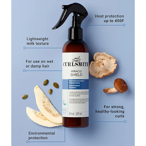 Image 1 - A Curlsmith Miracle Shield Heat And Environmental Protection Spray bottle stands on a light blue background, surrounded by shiitake mushrooms, pumpkin seeds, and guava slices, with text callouts Lightweight milk texture, For use on wet or damp hair, Environmental protection, Heat protection up to 450F, and For strong, healthy-looking curls, and visible bottle text Curlsmith Miracle Shield Heat And Environmental Protection Spray Spray Protecteur De Chaleur shiitake mushroom, guava, pumpkin seed, tea leaf, squalane champignon shiitake, goyave, graine de citrouille, feuille de the, squalane Vegan 8 fl oz 237 mL. Image 2 - A smiling woman with long, curly brown hair holds a Curlsmith Miracle Shield spray bottle, with overlay text My hair is shinier 89% agreed* and bottle label Curlsmith Miracle Shield Anti-Pollution Bond Repair Mist With 3-layer protection + strengthening actives 8 fl oz / 237 ml. Image 3 - A hand holds a Curlsmith Miracle Shield Heat And Environmental Protection Spray bottle, emitting a fine mist, with the overlaid text 88% agreed their hair felt stronger after use*. Image 4 - A brown spray bottle with a black trigger top of Curlsmith Miracle Shield Heat And Environmental Protection Spray is presented on a light blue background with white wavy patterns, alongside the bold text 95% agreed their hair felt protected after use*, and the bottle label includes the text Spray Protecteur De Chaleur, shiitake mushroom, guava, prickly pear, pumpkin seed, blackcurrant, kale leaf, squalane, champignon shiitake, goyave, dioecine, figue de barbarie, graine de courge, cassis, feuille de chou frisé, squalane, and 8 fl oz. 237 ml. Image 5 - The image shows a packaging update for Curlsmith Miracle Shield hair spray, with the old bottle on the left having a purple label and the new bottle on the right having a blue label, separated by an arrow, and a blue circle at the top right stating SAME GREAT PRODUCT NEW LOOK, with both bottles displaying CURLSMITH MIRACLE SHIELD Heat And Environmental Protection Spray 8 fl oz 237 mL.