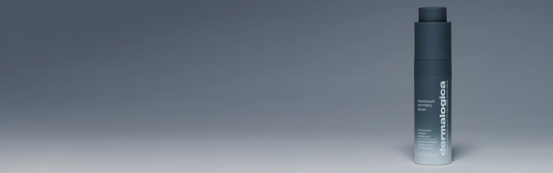 Dermalogica Neurotouch Symmetry Serum against a gradient Grey background
